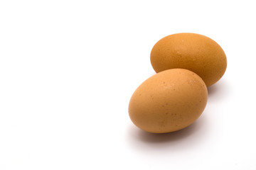 Two fresh eggs on white background, still life