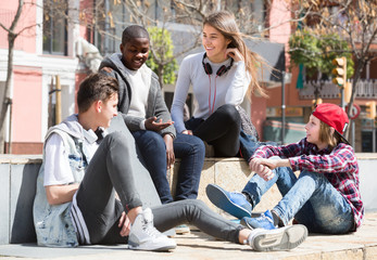 teens spending time together in sunny day