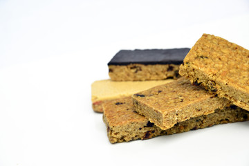 Snack protein raisin bar isolated on white