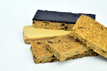 Snack protein raisin bar isolated on white