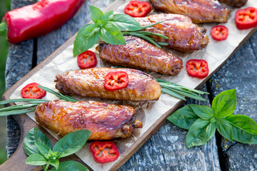 Baked spicy chicken wings in the Asian style