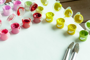 set of brightly colored acrylic paint