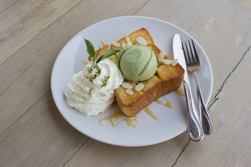 Ice cream green tea on honey toast and whip cream