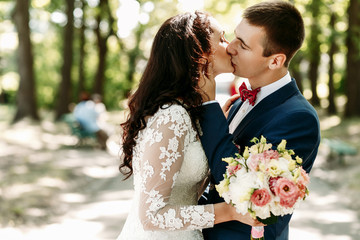 Happy newlyweds in park