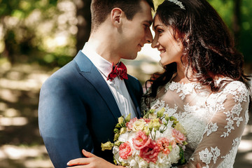 Happy newlyweds in park