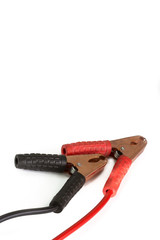 red and black battery jumper cable on white background isolate w