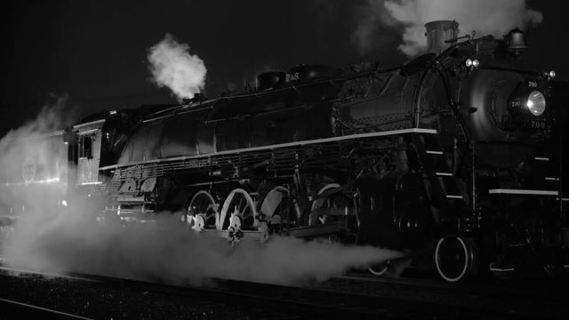 Steam locomotive at night  in black and white