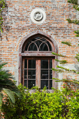 Fototapeta na wymiar castle's window at the wall