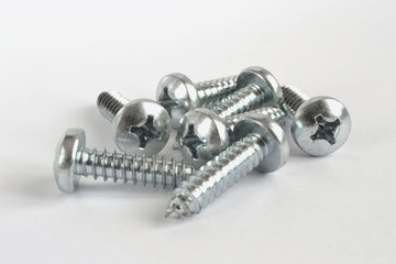 Screws on white