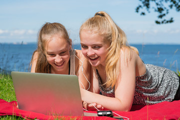 Two teenage girls enjoying summer