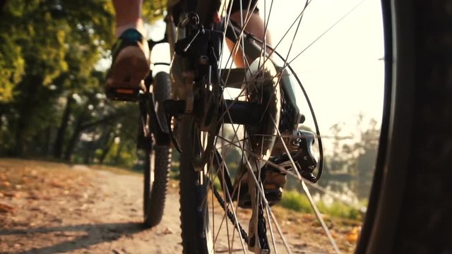 Man rides a bike near lake