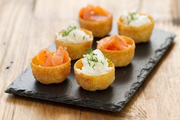 salmon with fresh cheese on board