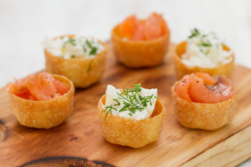 salmon with fresh cheese on board