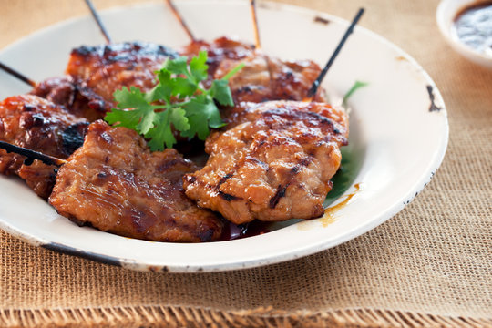 thai grill pork stick in zinc plate