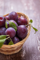 Plum on a table with a small