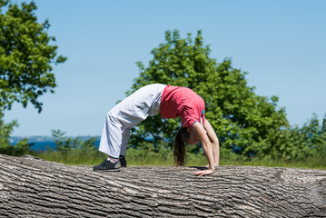 Young girl doing yoga