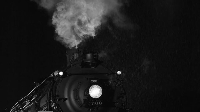 Steam locomotive at night  in black and white