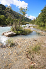 Fototapeta na wymiar Doire de Ferret, torrente affluente della Dora Baltea, in val Ferret (Valle Aosta)