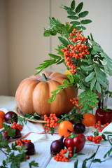 Yellow and red vegetables on the white wooden table