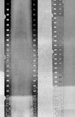 Fototapeta premium Camera filmstrip negative background texture (black and white)