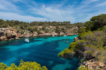 Naklejka premium Sail yachts in bay near Cala Pi, Mallorca, Balearic Islands, Spain.