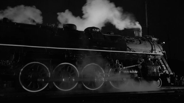 Steam locomotive at night  in black and white