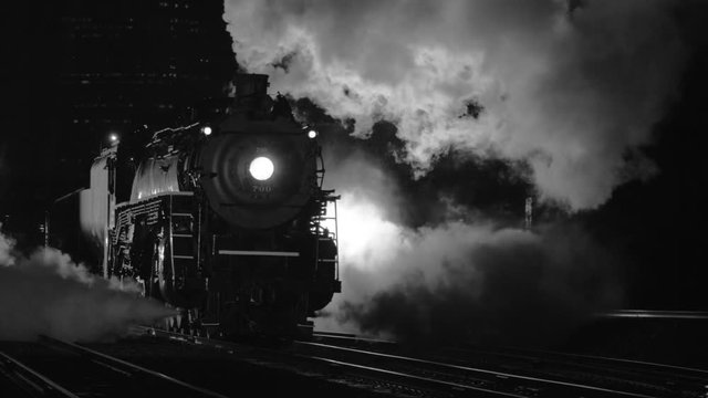 Steam locomotive at night  in black and white