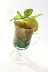 glass with cocktail of mint and lime