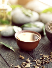 Tea oil in brown bowl, closeup