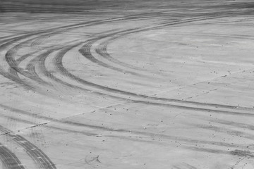 Tire burnout marks on road track background