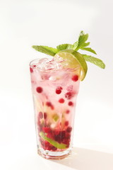cold cocktail with ice and cranberries