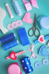 Flat lay of handcraft on blue background
