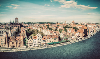 Fototapeta premium Panorama of Gdansk old town and Motlawa river in Poland. Vintage