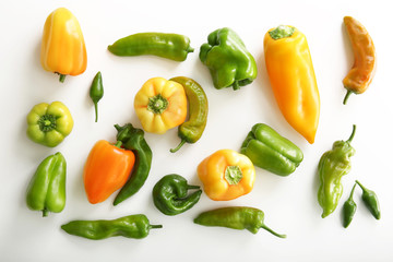Fresh peppers on white background