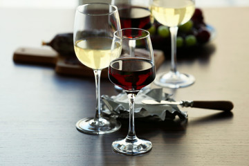 Glasses with wine on served table