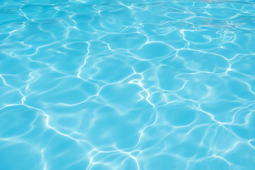 Plakat Ripple Water in swimming pool witn sun reflection