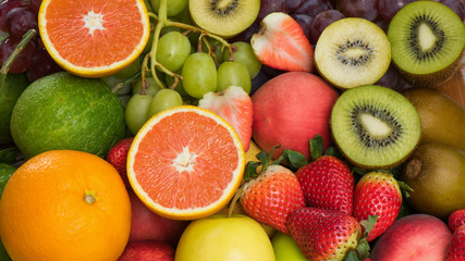 Arrangement fresh fruits and vegetables background
