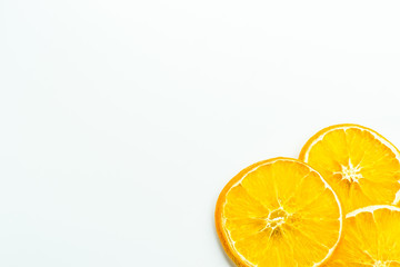 Dry orange slices on white background