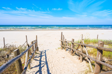 Entrance to sandy Debki beach on coast of Baltic Sea, Poland