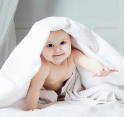 baby with a towel