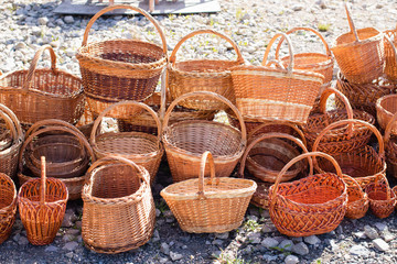 Many different wicker baskets for sale