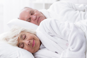 Fototapeta na wymiar Elderly marriage sleeping