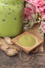 Iced green tea and matcha tea powder.