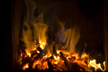 Fire in the fireplace. A good way of warming up the house with a romantic angle.