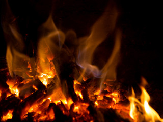 Fire in the fireplace. A good way of warming up the house with a romantic angle.