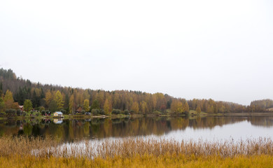 A view during autumn day on the lake.