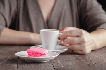 One macaroon and coffee