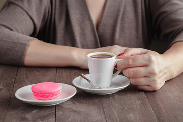 One macaroon and coffee