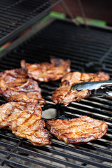 Grilled pork almost ready on the grill
