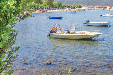 Fototapeta na wymiar Several fishing boat tied on sea shore